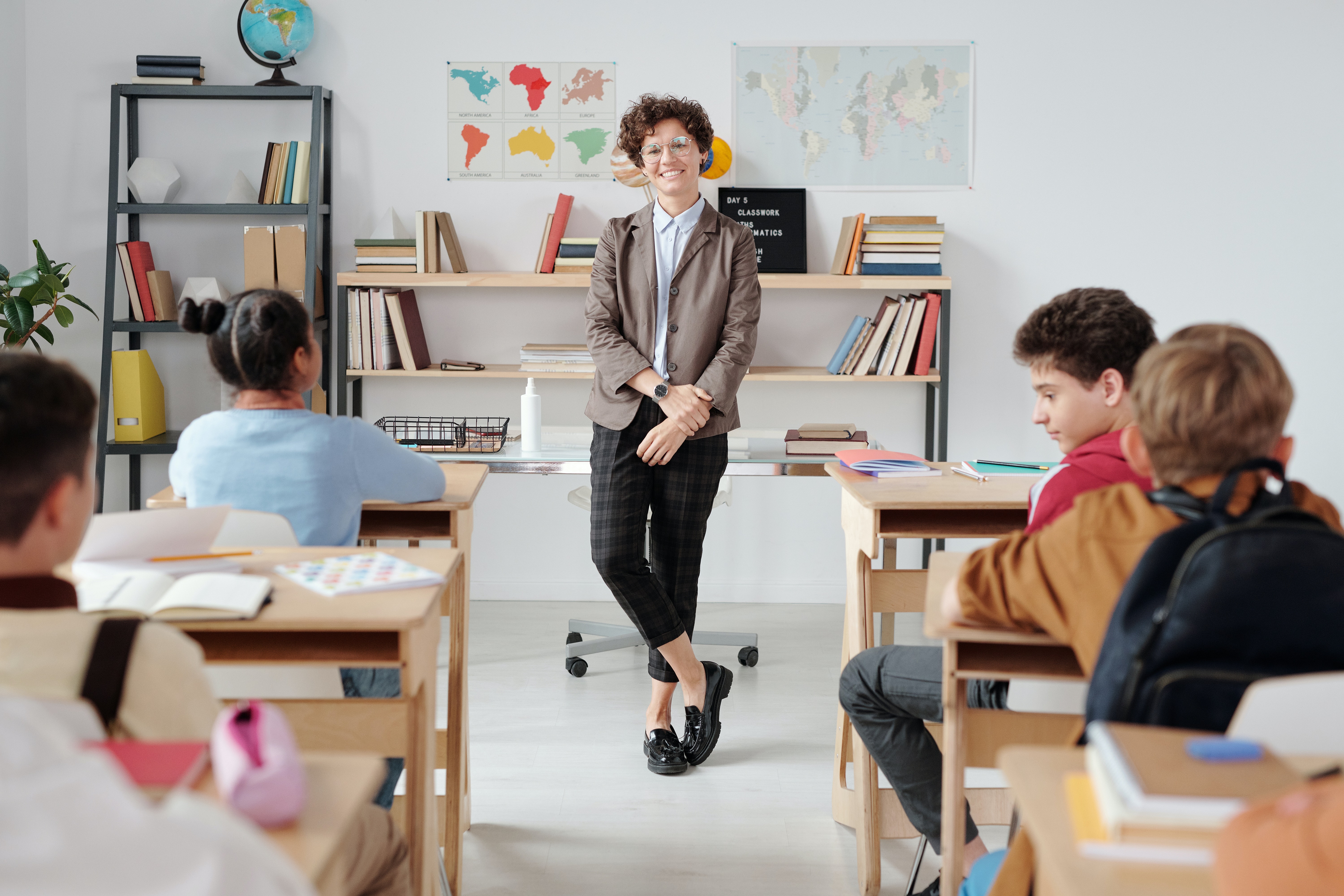 Teacher overlooking their class.